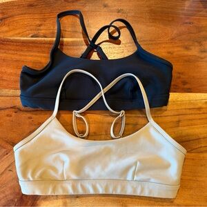 X2 ALO Yoga Black and Cream Airlift Intrigue Bras